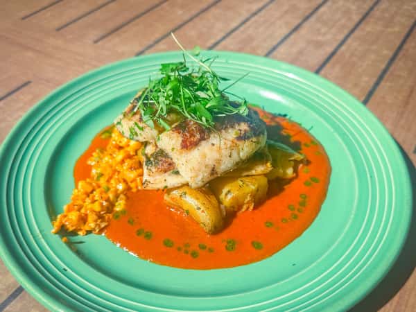 Sole with Mojo Rojo is our second special for this week! 🍽

Citrus- and cilantro-marinated filet of sole, pan-seared and served with chimichurri potatoes, mojo rojo, and roasted corn off the cob.
