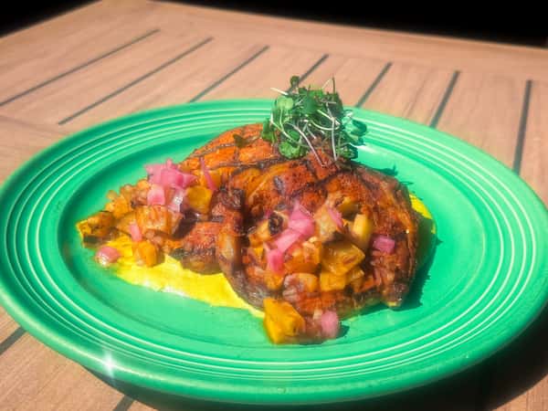 Chuletas Adobadas con Mojo Amarillo is our third special for this week! 🍽

Two pork chops marinated in dried chiles and citrus juices, topped with roasted pineapple chutney. Served with crispy new potatoes and mojo amarillo sauce.