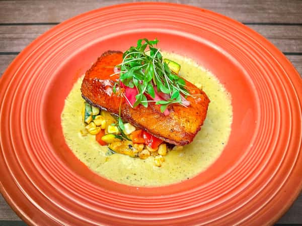 Salmon Adobado is our second special for this weekend! 😋

Fresh salmon marinated in adobo and served with tomatillo-Suiza sauce, a medley of zucchini, roasted corn, and pasilla chiles. Topped with pickled onions and micro cilantro.