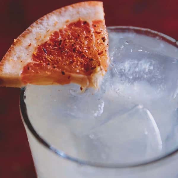 Cocktail with citrus garnish