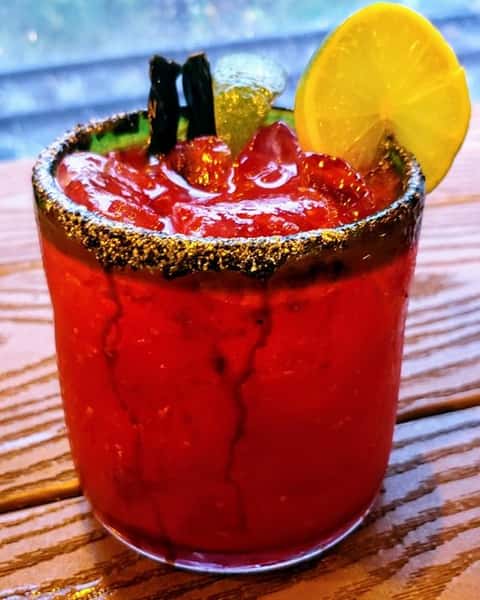 Red alcoholic drink.