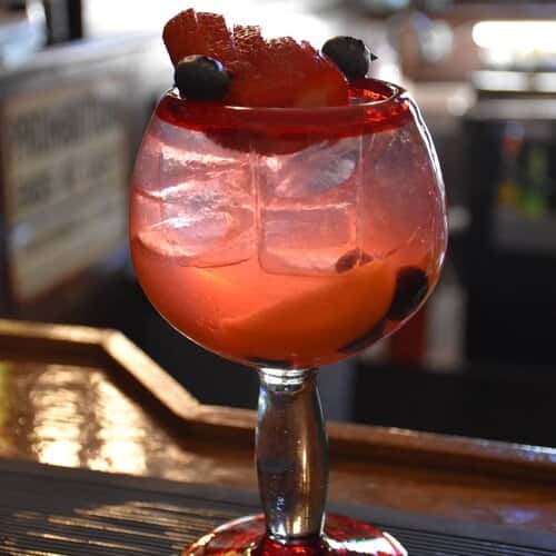 Red alcoholic drink.