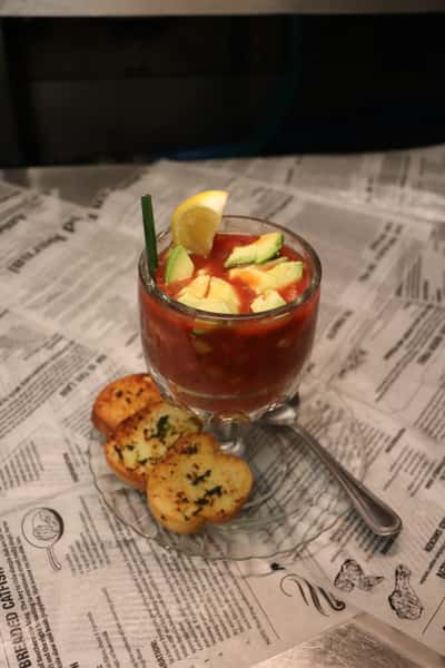 Bowl of Chilled Gazpacho with Shrimp and Avocado