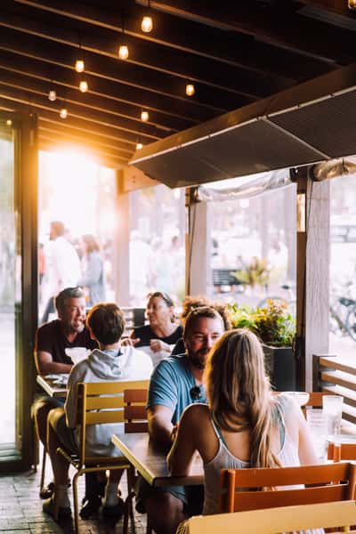 people dining on restaurant patio