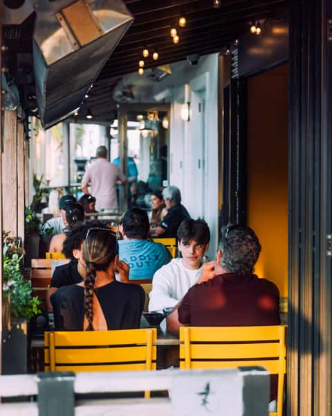 people dining on restaurant patio