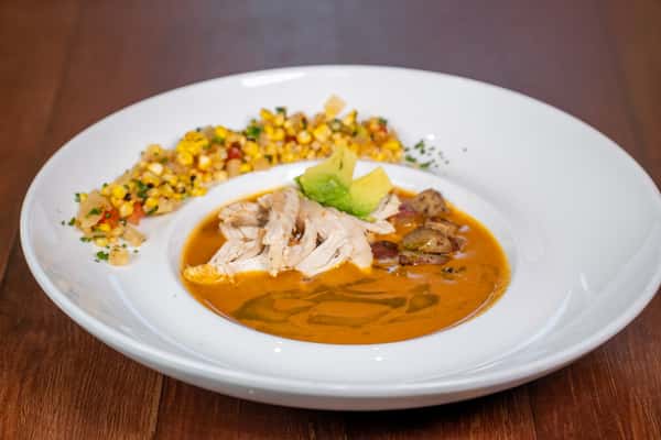Soup with a corn garnish