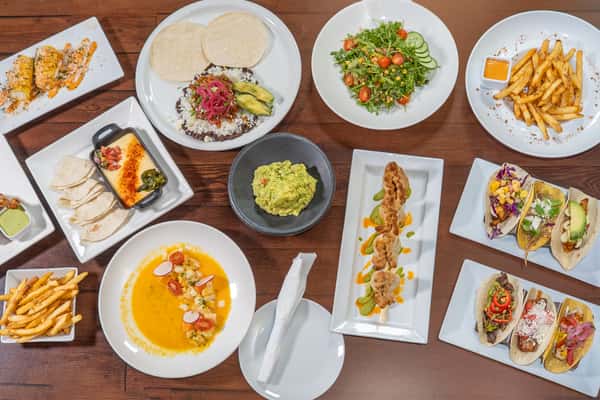 A variety of Mexican dishes on a dining table