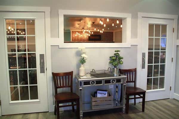small waiting area with 2 chairs