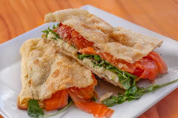 SALMON ( Salmon, Tomatoes, Mozzarella, Arugula, Shaved Parmesan, Garlic)