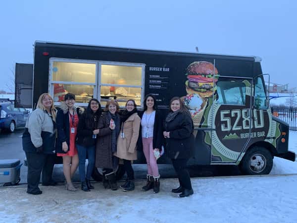 staff in front of the food truck
