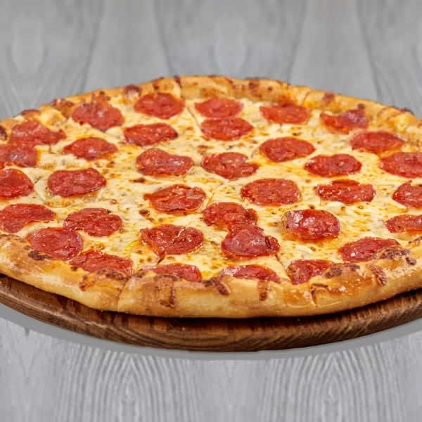 Pizza with pepperoni, sausage, green and orange bell peppers on a brown pizza peel.