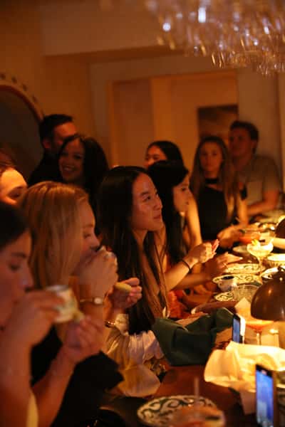 girls at bar watching the game