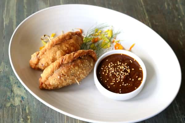 Empanadas de Borrego, crispy lamb-filled pastries served as an appetizer at Zaranda Houston