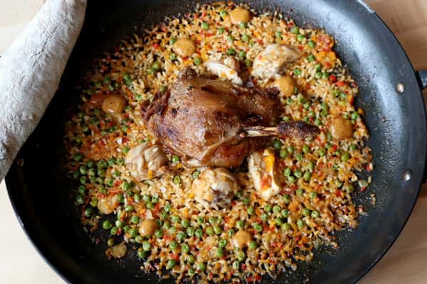 Pato y Conejo Arroz, duck and rabbit rice dish with rich flavors, a refined entrée at Zaranda Houston