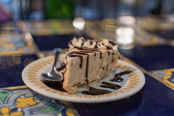 peanutbutter pie topped with chocolate syrup