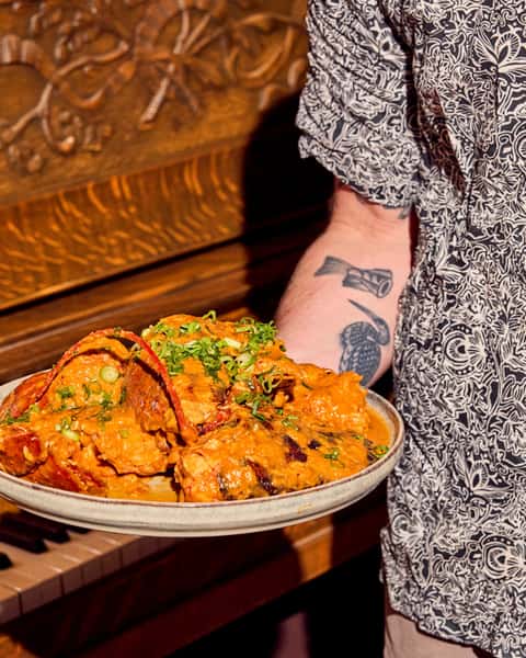 Cold-water lobster and snow crab claws in a rich chili XO sauce, with warm mantou buns