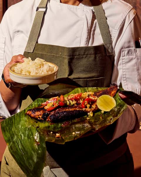 Wrapped in banana leaf, grilled in our Mibrasa, served with pineapple, tomato and nasi santan