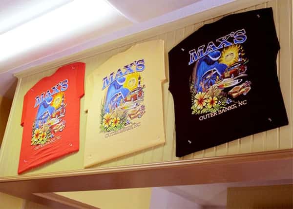 t-shirts hanging on the wall