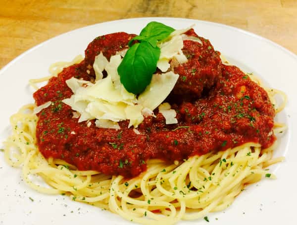 Spaghetti with red sauce on top