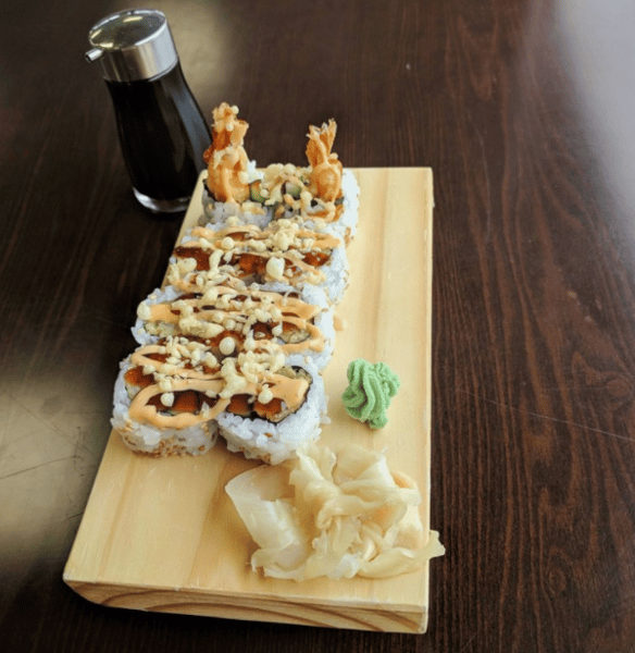 sushi roll on a wooden board