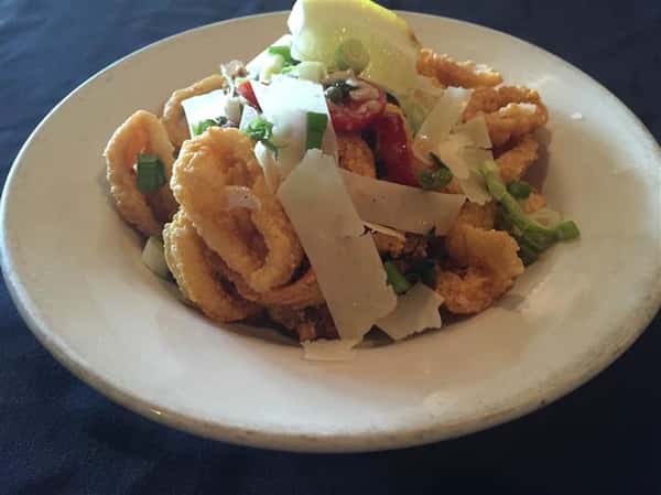 fried calamari salad with lettuce and cheese
