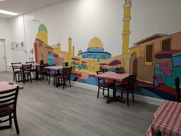 Interior dining room with tables and chairs