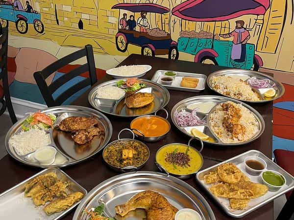 Indian and Pakistani food spread on a table