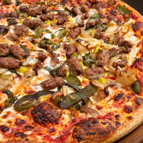 Appetizing pizza and pasta on wood