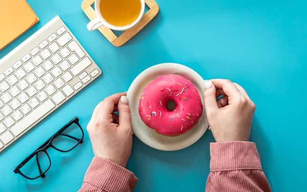 donut with laptop, glasses and juice