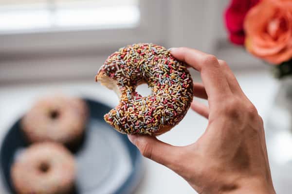 Bitten donut with a bokeh effect