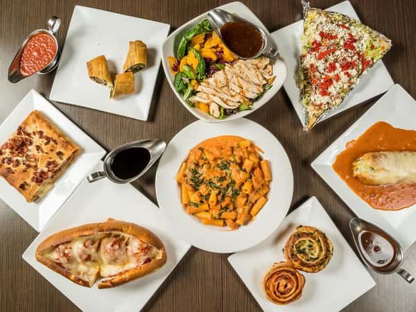 an assortment of italian dishes on a table