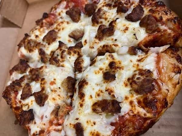 pizza topped with sausage