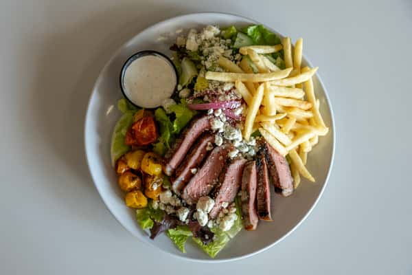 Salad with steak and fries
