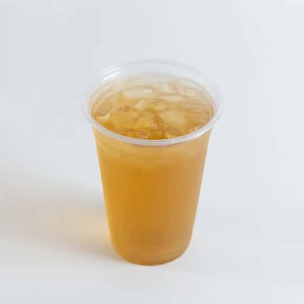 refreshing sweet iced tea served in a clear plastic cup with ice