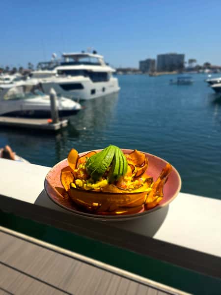 plate of food outside by the water