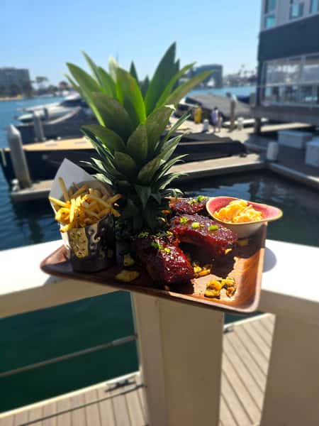 plate of food outside by the water