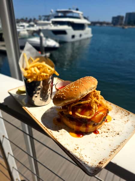 plate of food outside by the water