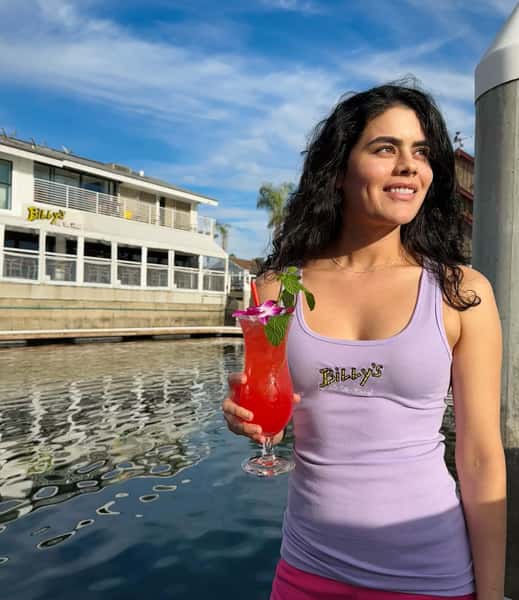Girl holding a signature drink