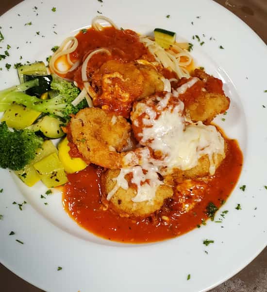 Fried shrimp with red sauce and vegetables