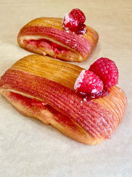 ✨ **Saturday Specials are here!** ✨

We’ve got a delicious lineup of freshly baked favorites waiting for you this weekend:

• Raspberry White Chocolate Pain Suisse
• Lemon Cream Squares
• Biscoff Cookie Butter Cruffins
• Strawberry Pop Tarts
• Original Pain Suisse
• Strawberry Cake Pops
• Sourdough Chocolate Chip Cookies
• Spiral Croissant Dogs
• Blueberry Cheesecake Rolls
• Dubai Chocolate Croissants
• Double Chocolate Brownies

**Make Ollio part of your Saturday plans!** Stop by early and treat yourself to something freshly baked—our specials are available **while supplies last!**

📍 **OLLIO PATISSERIE — THE COLONY**
📍 **OLLIO PATISSERIE — FRISCO**

**Two locations, one delicious weekend destination. Come see us this Saturday!** 🤍
