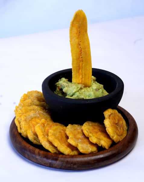 Guacamole with crispy tostones and chifles