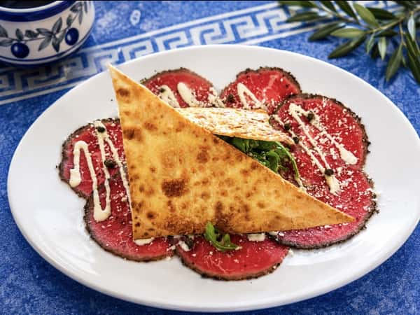 Elegantly plated Greek food