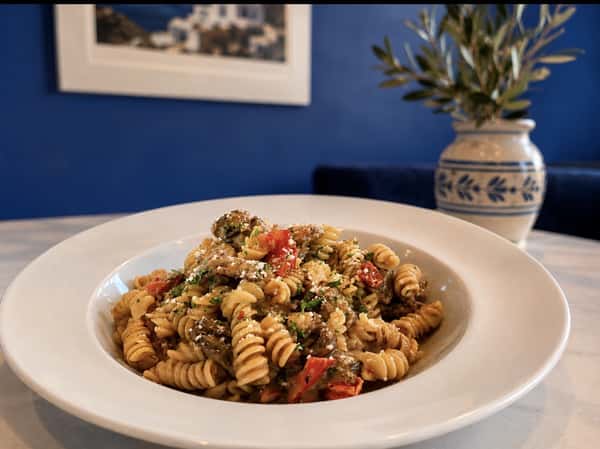 Spiral pasta with freshly roasted veggies and sauce