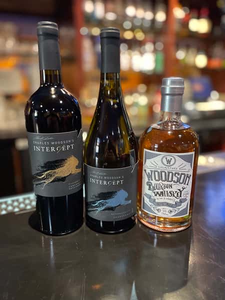 Intercept Wines and Woodson Whiskey bottles displayed at the bar, featuring premium wine and whiskey selections at Bobby Salazar's Mexican Restaurant & Cantina.