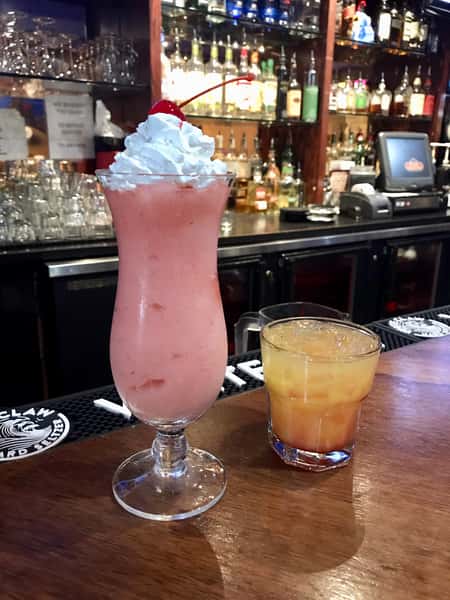 Refreshing piña colada and tequila sunrise cocktails handcrafted with tropical flavors and premium tequila at Bobby Salazar's Mexican Restaurant & Cantina.