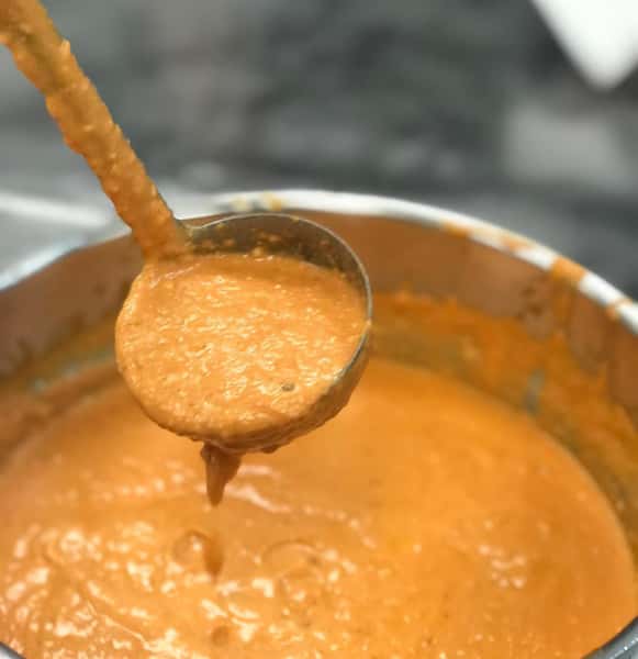 prepping sauce in a pot
