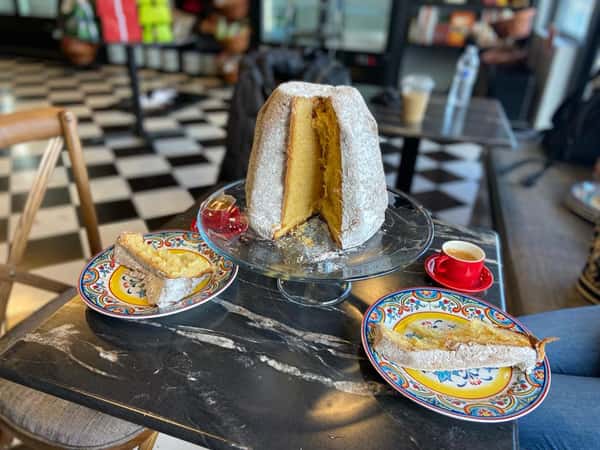 sliced cake on a table served on two plates