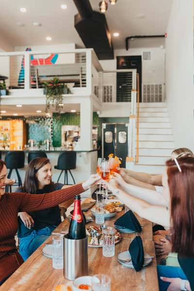 people dining and drinking together