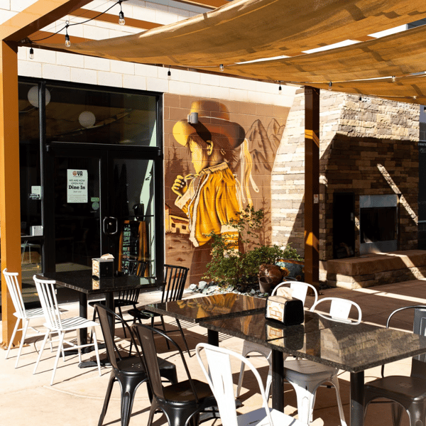 O'YA Cantina patio with mural