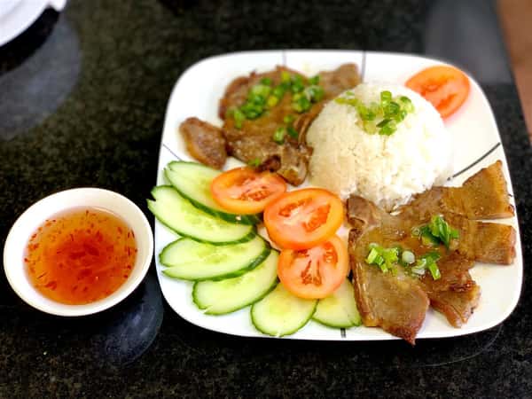 (60) Charbroiled Pork Chops on Steamed Rice